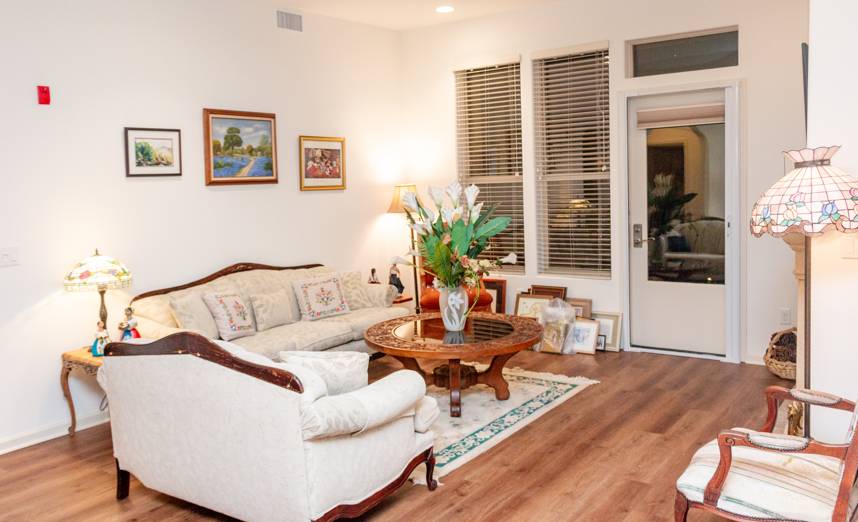Senior's living room furnished and resettled after a Arlington senior relocation